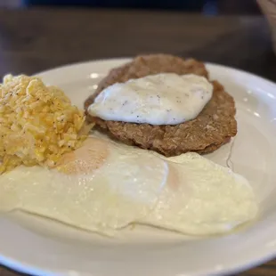 Country fried steak, bland and you will have to smear the gravy over your meat!