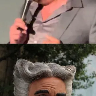 a man with a microphone in his mouth