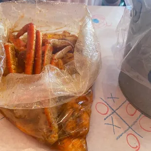 Seafood boil (crab, andouille sausage, lobster tail, corn) mild crackin sauce.