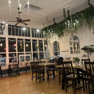 a dining room with a ceiling fan