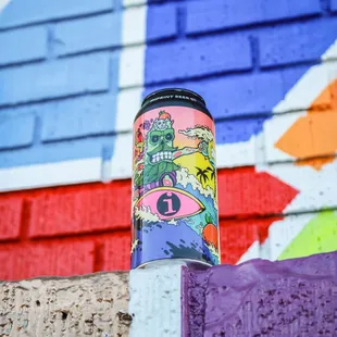 a can of craft beer on a brick wall