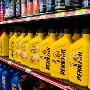 a row of motor oil bottles