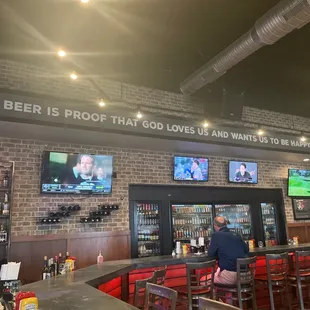 a man sitting at a bar