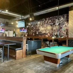 a pool table and bar
