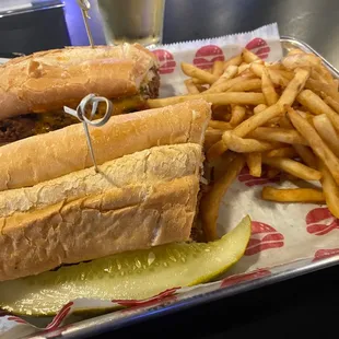 Philly cheesesteak sandwich w/ fries