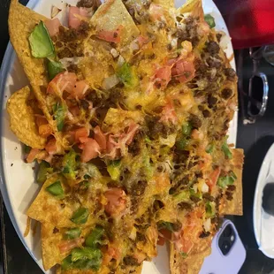 Happy hour nachos with spicy beef. Super dry.