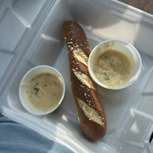 Pretzels with cheese sauce.