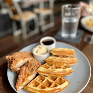 a plate of chicken and waffles