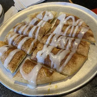 cinnamon roll with icing drizzle