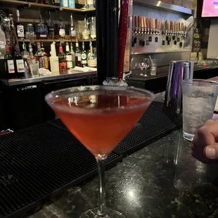 a cocktail in a martini glass