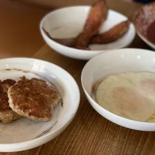 Sausage, bacon, over easy eggs