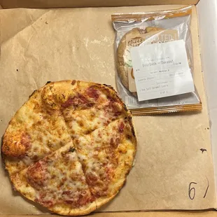 The pizza was just a little bigger than a cookie.  These two with a soda, delivery and tip was $34