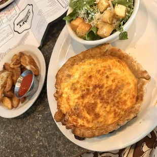 Sausage quiche, potato&apos;s and Caesar salad.