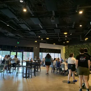 a large group of people in a restaurant