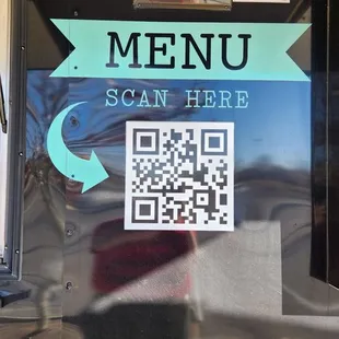 a barbeque with a qr code on it