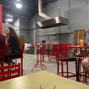 a man and woman sitting at a table