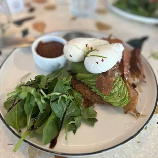 Potato Rosti, Avocado, Crispy Bacon, Poached Egg, Tomato Relish