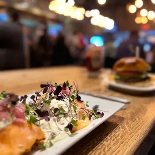 #1 Smoked Salmon Eggs Benedict with capers and cream cheese.  #2 order is Craft Burger
