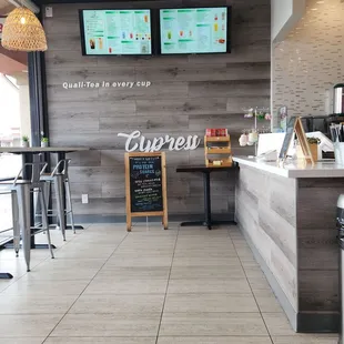 the counter and seating area of a coffee shop