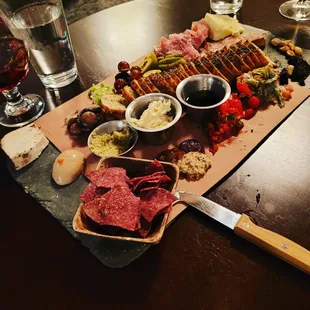 Ploughmans board with charcuterie chips and bread