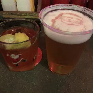Whistle Pig Piggy Back Rye Sazerac and a Santa-tattooed Free Dive IPA by Coppertail.