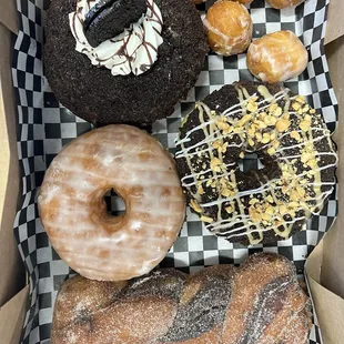 a variety of doughnuts in a box