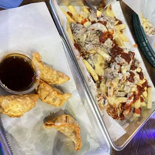 Bobcat Cheese Fries and potstickers