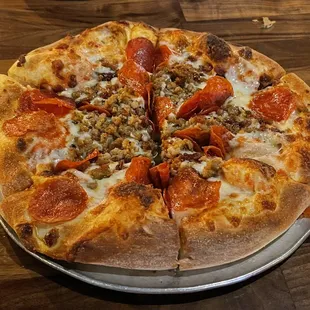 a pepperoni and sausage pizza
