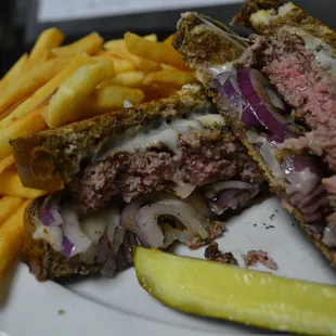 Grilled Reuben – Corned Beef, Sauerkraut, Swiss Cheese, 1000 Island on Grilled Marble Rye Bread