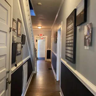 a hallway leading to a door