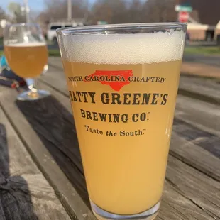 a pint of crafty green's brewing co