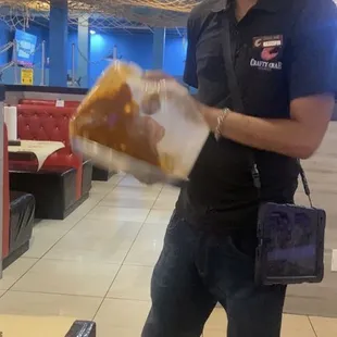 Trent bringing the crab boil