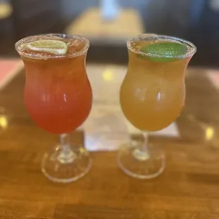 two cocktails on a table