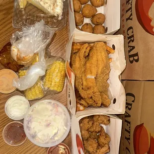 Fried Catfish Basket,  Fried Shrimp Basket, Coleslaw, Hush Puppies, and Corn on the Cob.