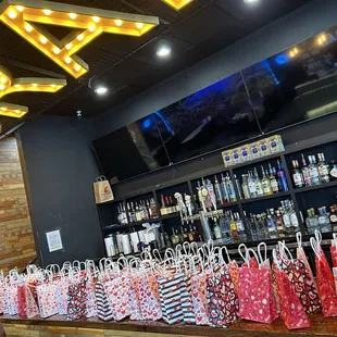 a bar with a lot of bags