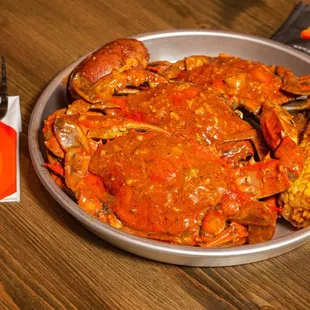 a bowl of cooked crab