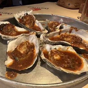 six oysters on a silver platter