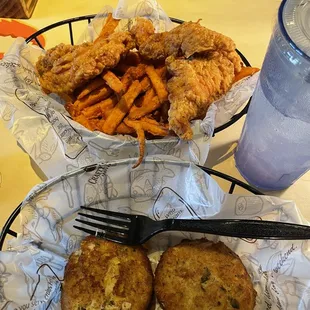 Chicken Strip basket with Sweet Potatoe fries and an order of crab cakes.