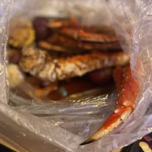 King Crab Leg seafood boil with Bomb Fire sauce