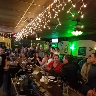 people sitting at a bar