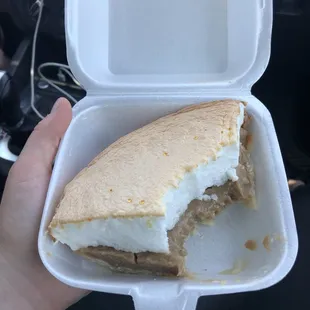 a sandwich in a styrofoam container