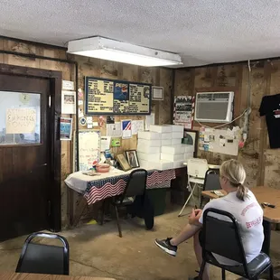 a woman sitting at a table