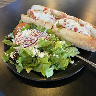 Italian Sausage sub and Greek salad