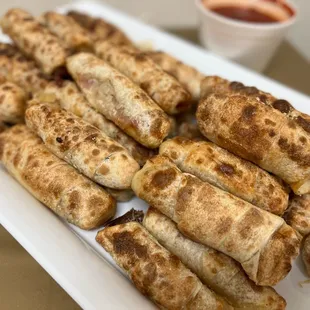 a platter of pizza rolls