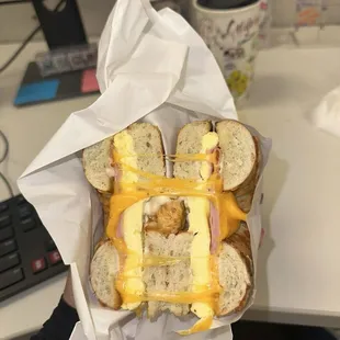Egg ham and cheese on a Asiago bagel