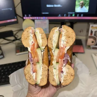 Cucumber, tomato, & onion on a sundried tomato bagel