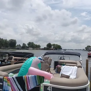 a row of pontoons docked at a dock