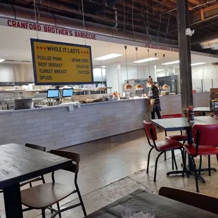 a restaurant with tables and chairs