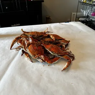 a pile of crabs on a table