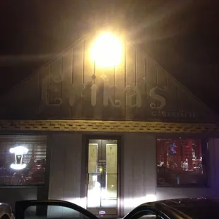 the front of the building at night